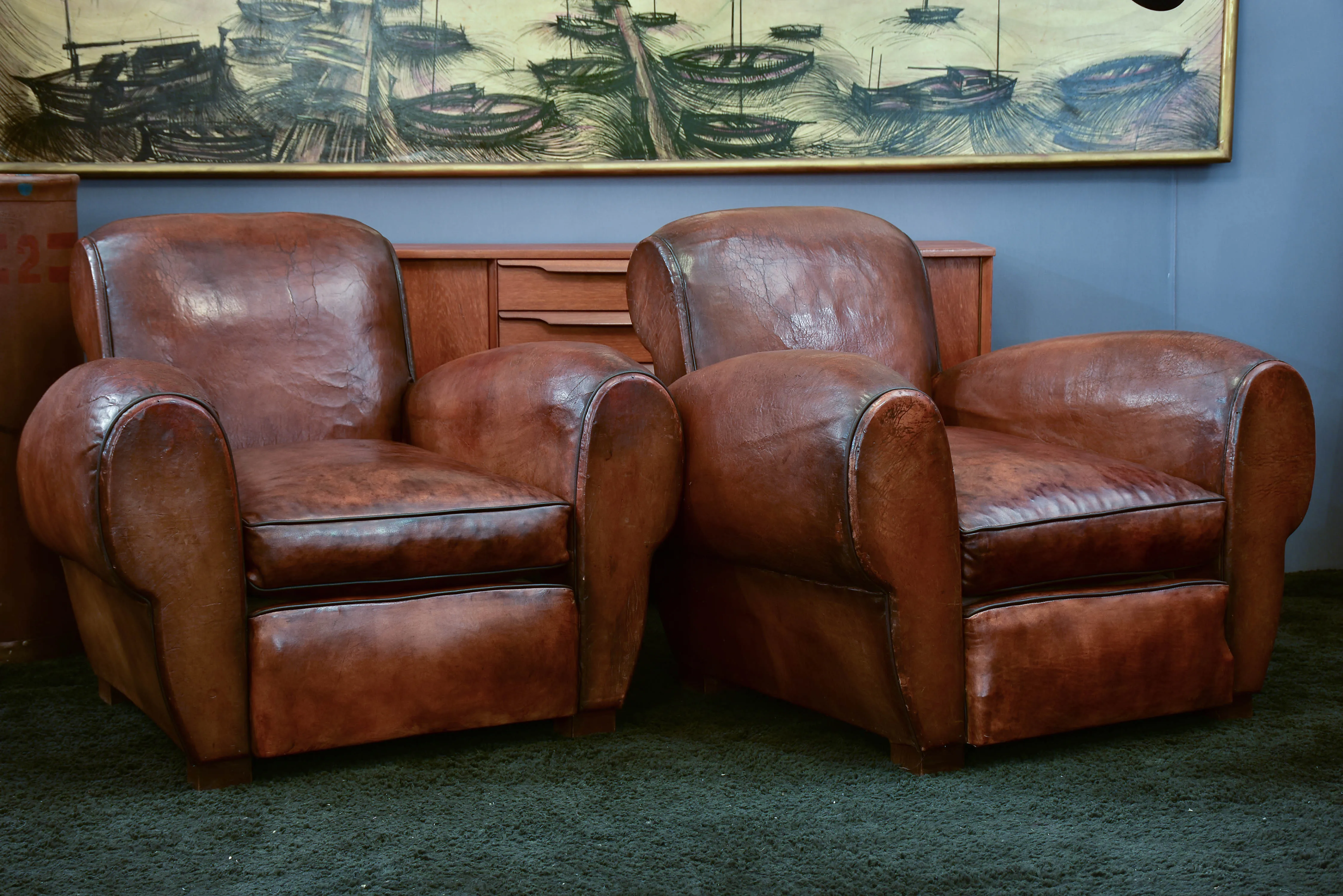 Three French leather club chairs