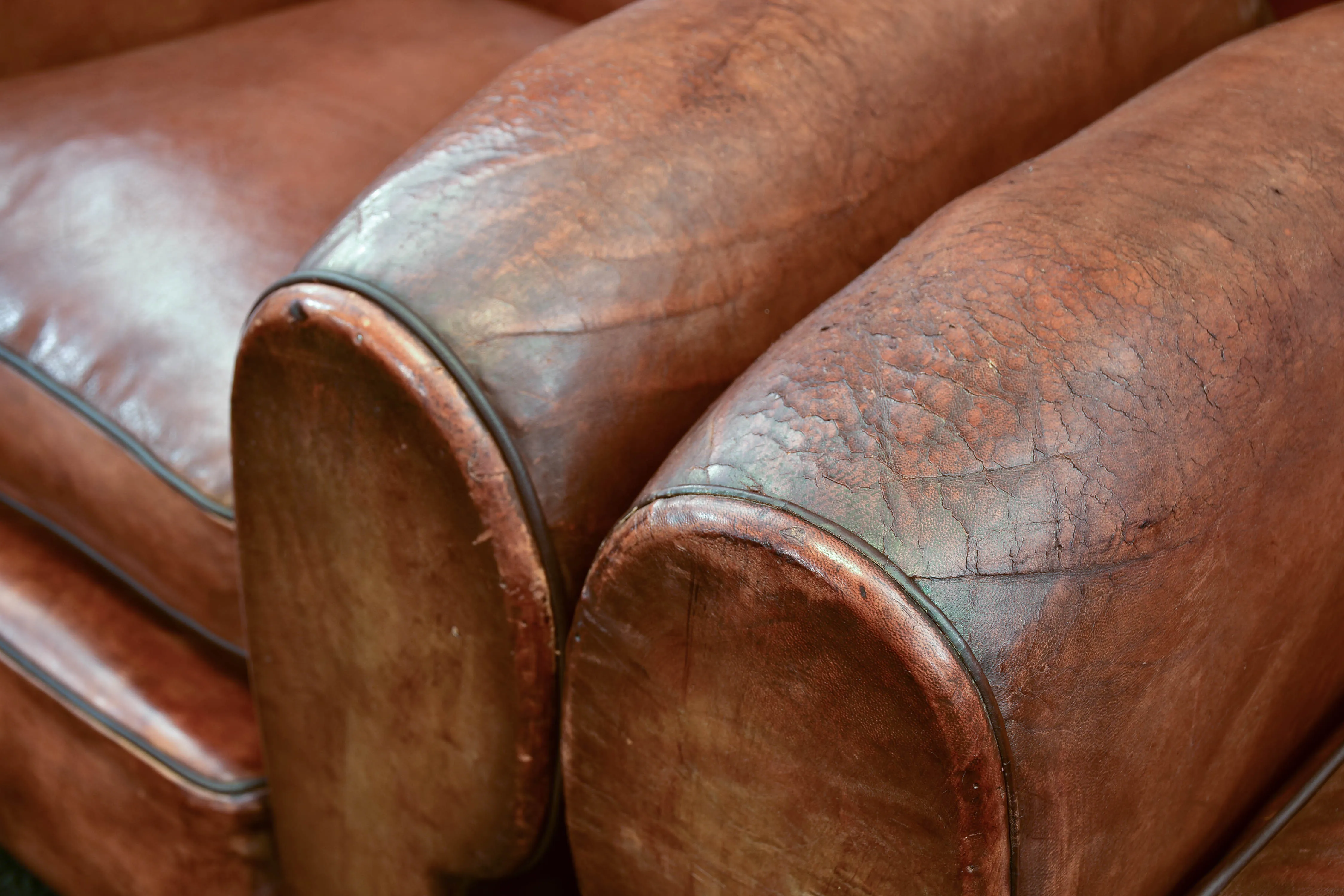 Three French leather club chairs